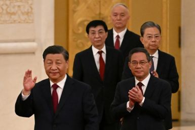 China's President Xi Jinping (L) and other top officials are gathering for the party's secretive Third Plenum on Monday