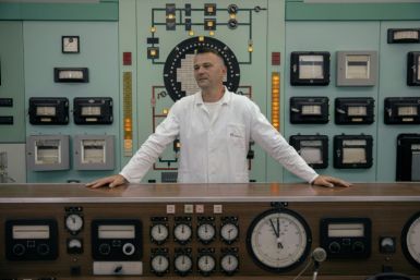 Dalibor Arbutina, director of Public Company Nuclear Facilities of Serbia (NFS), stands in the control room of a decommissioned nuclear reactor