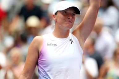 Easy does it: Iga Swiatek celebrates after defeating Ena Shibahara of Japan
