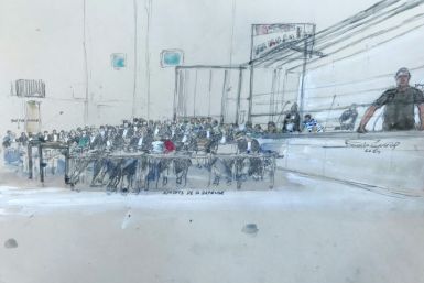 Eighteen of the 51 accused including Dominique P. are in custody, while 32 other defendants are attending the trial as free men