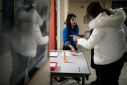 A Medecins du Monde volunteer offers advice to a sex worker in Paris