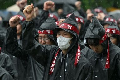 Members of the National Samsung Electronics Union stage a rally during their three-day general strike