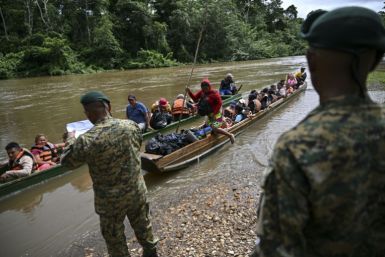 Migrants arrive at a reception center in Panama after crossing the Darien jungle from Colombia
