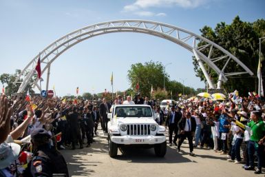 Pope Francis landed to a rock star welcome in East Timor, where tens of thousands of jubilant devotees lined the streets