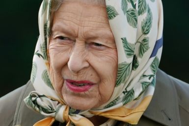 The sculpture depicts the queen in a headscarf and country dress