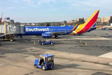 A Southwest Airlines Boeing 737 sits at a gate at Washington's Reagan National Airport (DCA) in Arlington, Virginia, on March 31, 2024