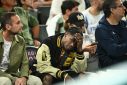 Travis Scott was seen attending the Olympics men's basketball semi-finals on Thursday evening