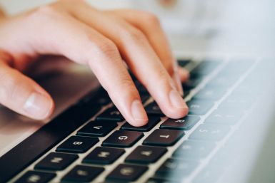 typing on laptop