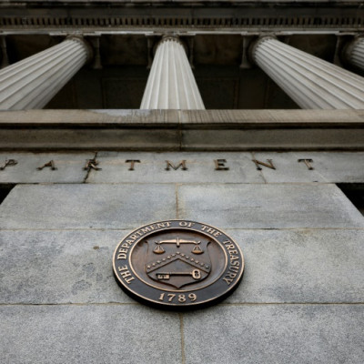 The US government's budget deficit widened by 23 percent, with revenue bogged down by lower tax receipts