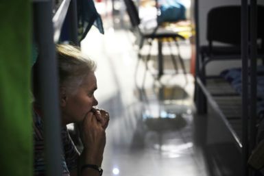 War-displaced people spend time in a centre for displaced people in undisclosed location in Kursk region on August 29, 2024