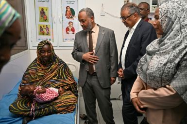 World Health Organization (WHO) Director-General Tedros Adhanom Ghebreyesus (C) visits a children's hospital in Port Sudan -- he said 'insufficient action' is being taken to respond to Sudan's war